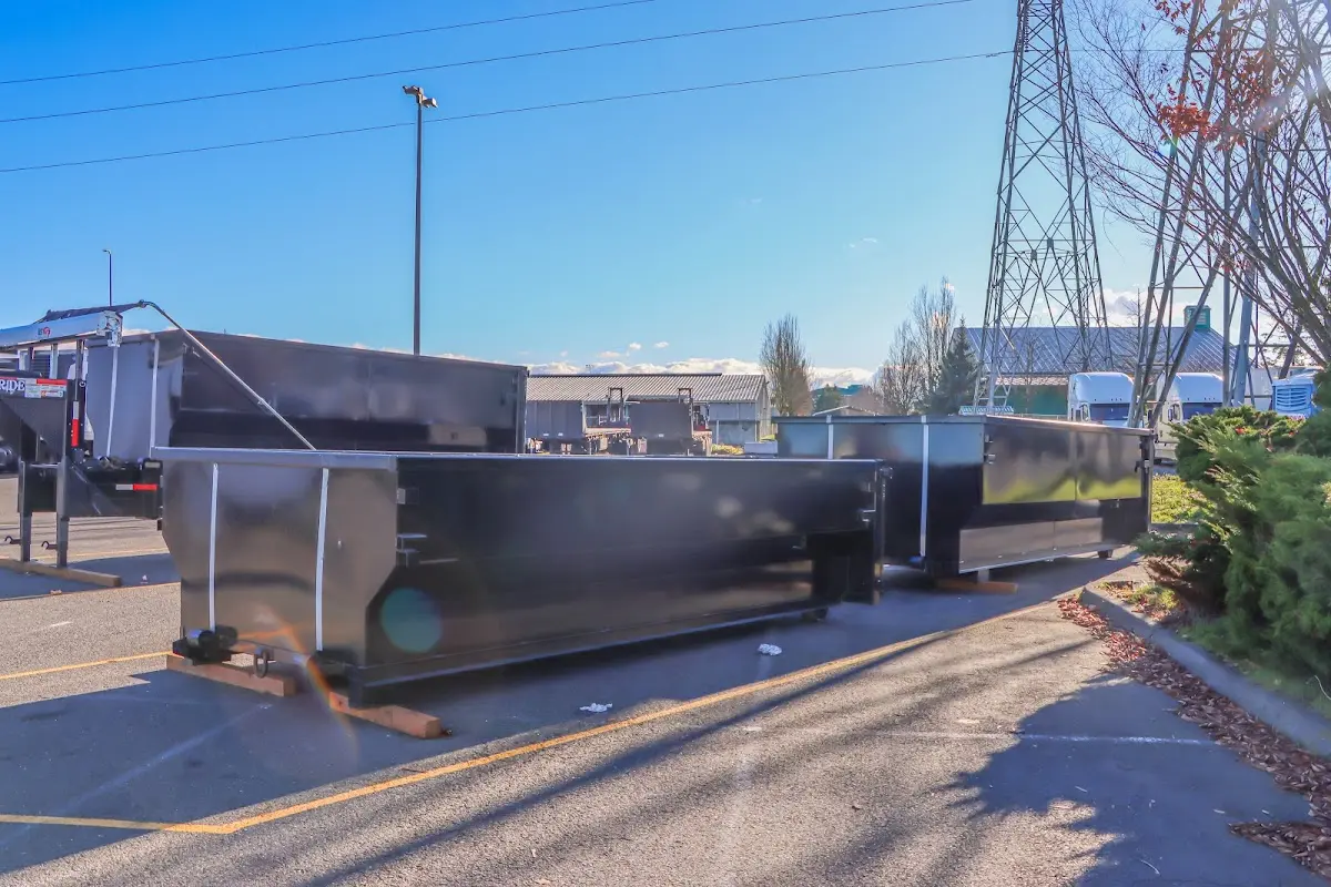 Roll-off dumpster ready for waste disposal at job site for Commercial Dumpster Rental in Westwood